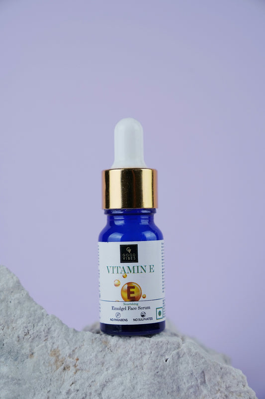 A bottle of vitaminine sitting on top of a rock